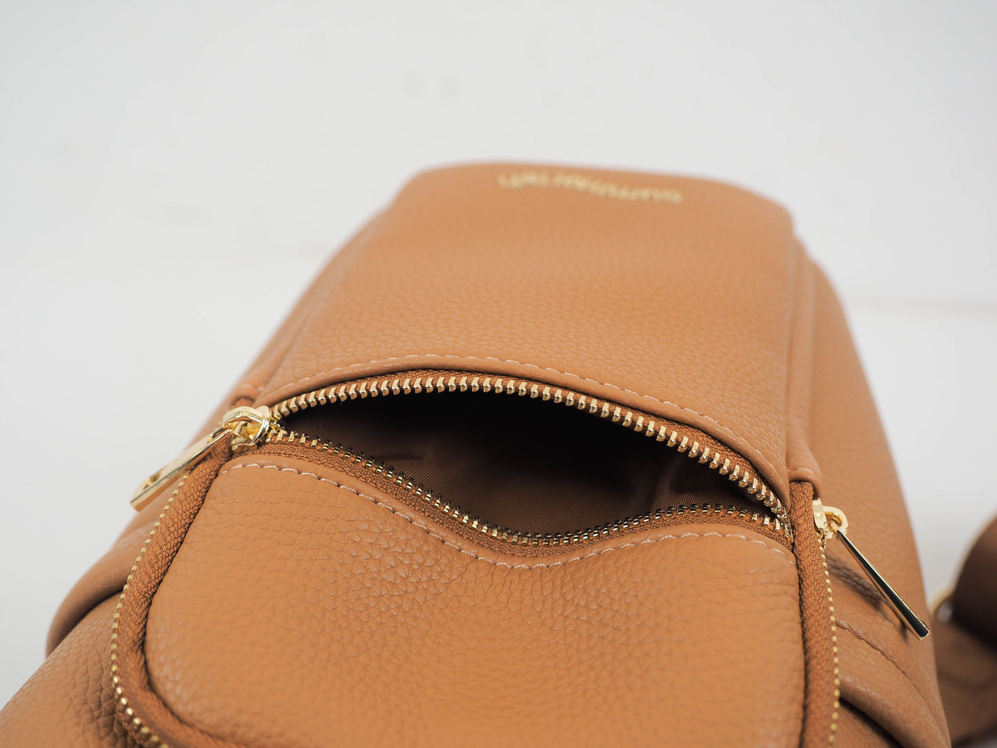 Tan water bottle bag zip