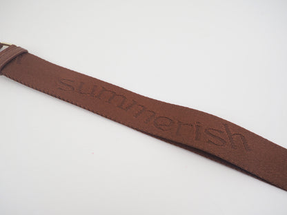 Brown water bottle bag strap