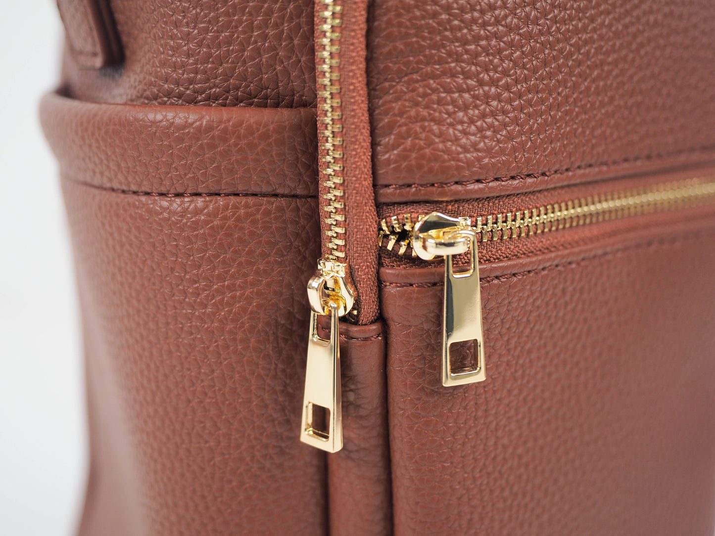 Brown water bottle bag zips