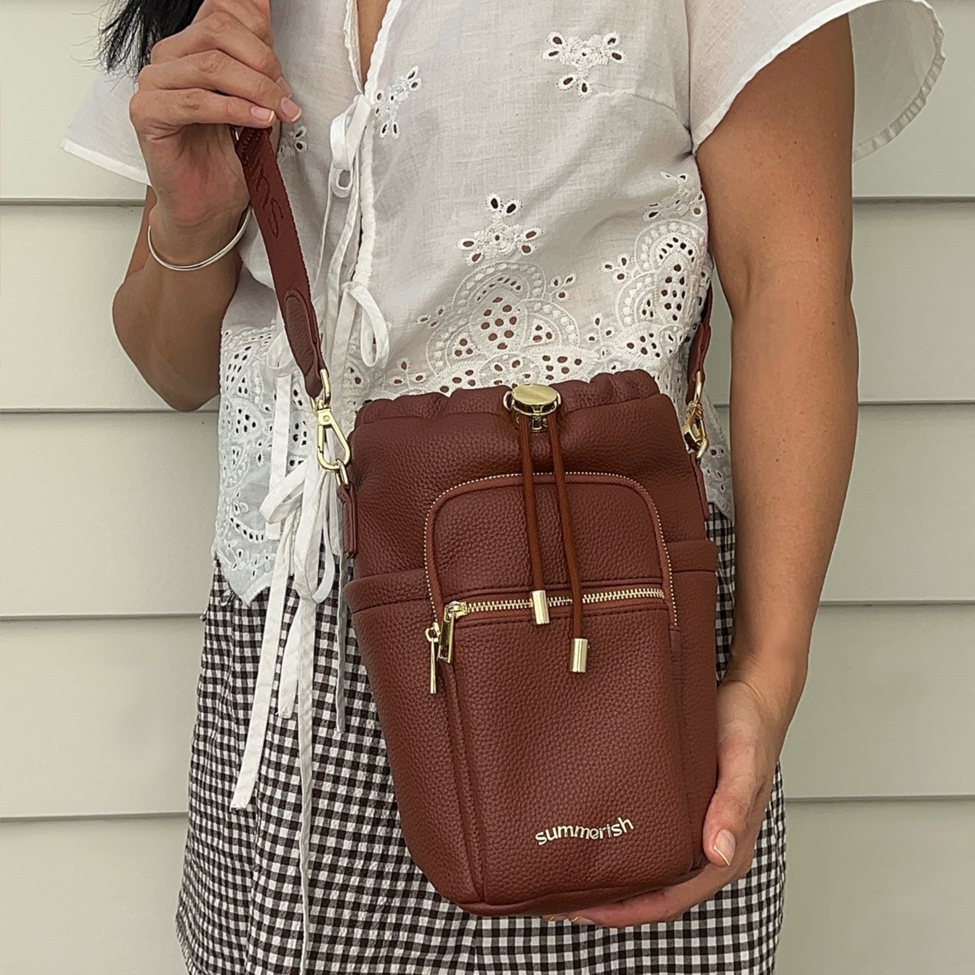 Brown water bottle bag on model